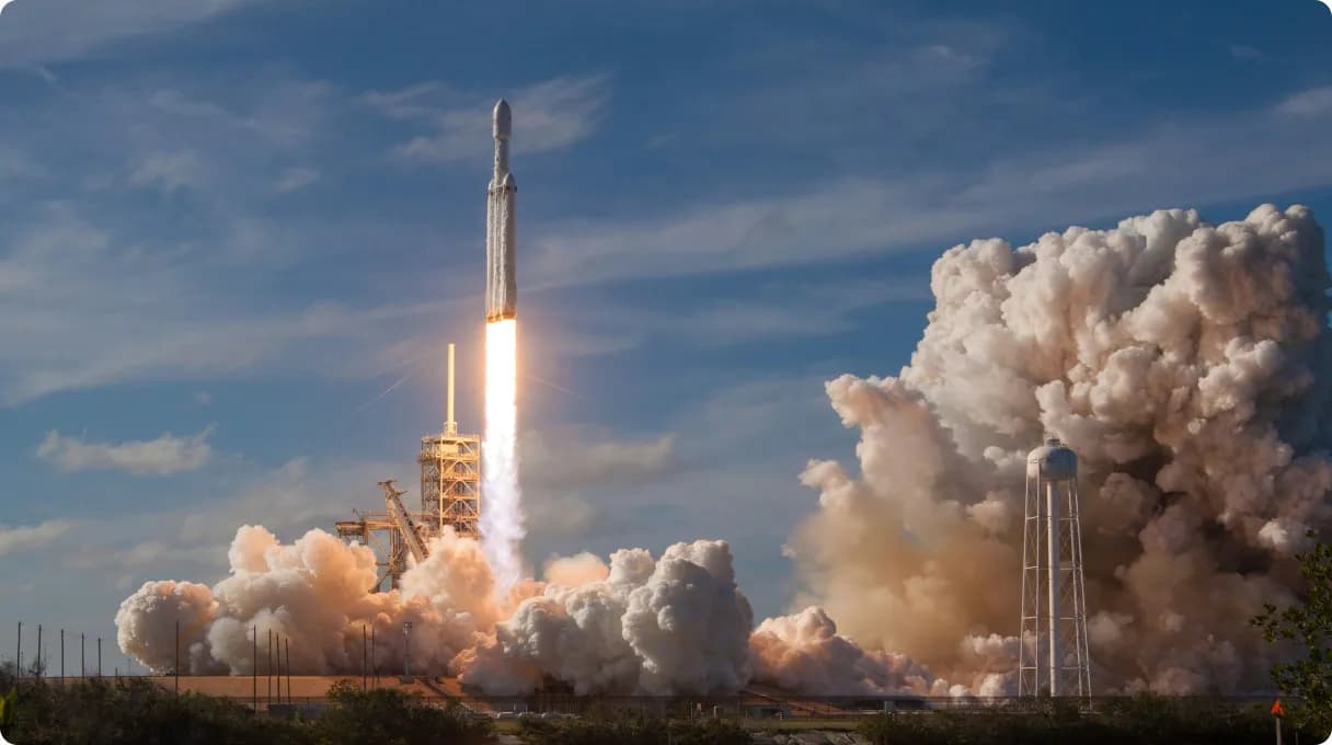 three-men-sitting-on-chair-beside-tables